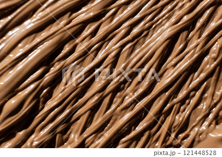 Macro Texture Natural Melted Milk Chocolate Top View 121448528