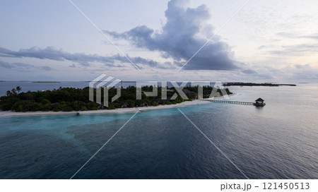 Top view of the sunset over an island in the ocean 121450513