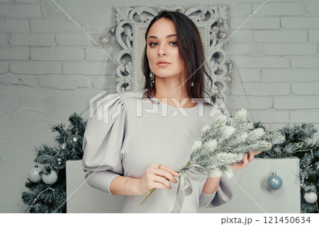 Sophisticated Woman in Grey Dress with Frosted Bouquet. 121450634