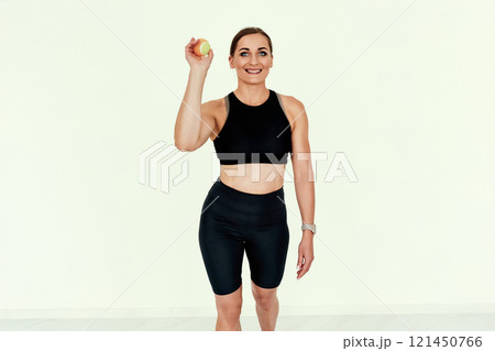 Fitness Trainer Holding Tennis Ball. Fitness Trainer Holding Tennis Ball. 121450766