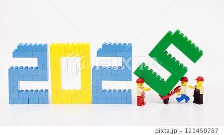 workers set up the new year 2025 wording 121450787
