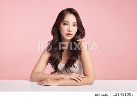 Beautiful young asian woman with clean fresh skin on pink background, Face care, Facial treatment, Cosmetology, beauty and spa, Asian women portrait. Beautiful young asian woman with clean fresh skin on pink background, Face care, Facial treatment, Cosmetology, beauty and spa, Asian women portrait. 121451008