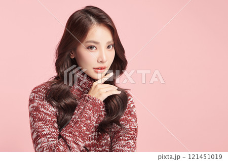 Beautiful young asian woman with clean fresh skin on pink background, Face care, Facial treatment, Cosmetology, beauty and spa, Asian women portrait. 121451019