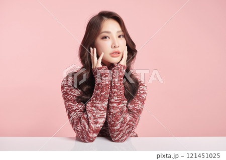 Beautiful young asian woman with clean fresh skin on pink background, Face care, Facial treatment, Cosmetology, beauty and spa, Asian women portrait. 121451025