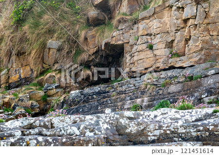 The beautiful stone layers at Muckross Head beach, County Donegal, Ireland. The beautiful stone layers at Muckross Head beach, County Donegal, Ireland. 121451614