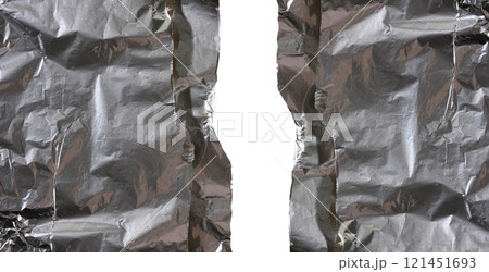 Crumpled sheet of gray foil for packaging products with torn edges on a isolated background 121451693
