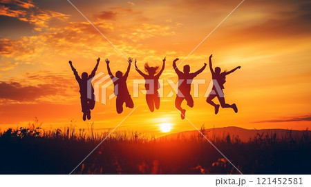 Group of Friends Jumping in Sunset Silhouette Celebrating Outdoors_5 121452581