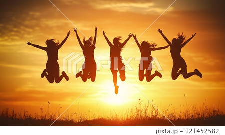 Group of Friends Jumping in Sunset Silhouette Celebrating Outdoors_6 121452582