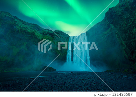 Aurora Borealis over famous Skogafoss waterfall on Skoga river 121456597