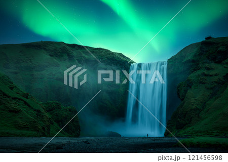 Aurora Borealis over famous Skogafoss waterfall on Skoga river 121456598