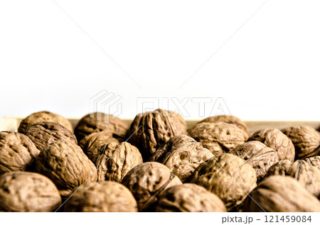 Group of fresh walnuts on white background Group of fresh walnuts on white background 121459084