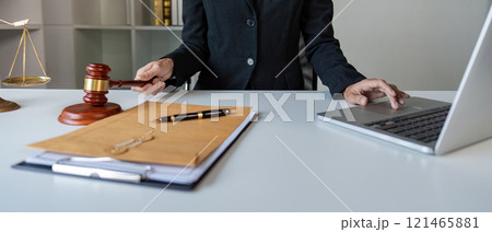 Lawyer preparing case documents office setting professional environment focused viewpoint legal strategy insight Lawyer preparing case documents office setting professional environment focused viewpoint legal strategy insight 121465881