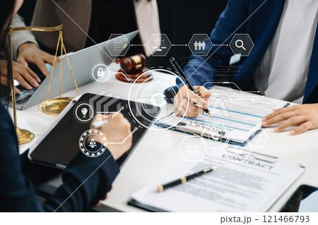 Copyright or patent concept, Business team analyzing data and using smart phone and tablet with virtual screen 121466793