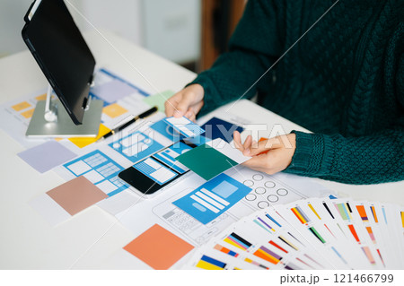 UX graphic designer planning application process development prototype wireframe for web smart phone. Creative digital development 121466799