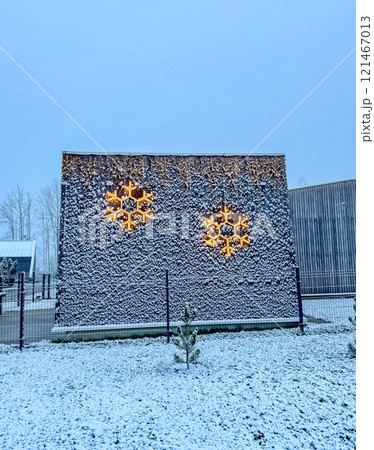 Snowy Wall with Glowing Snowflake Lights in a Winter Wonderland. High quality photo Snowy Wall with Glowing Snowflake Lights in a Winter Wonderland. High quality photo 121467013