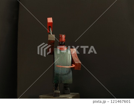 Blacksmith with red hammer above head 121467601