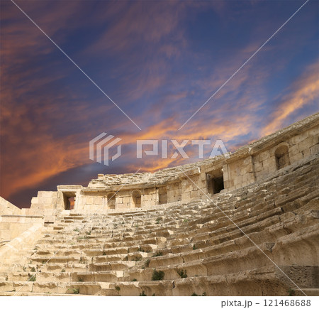 Amphitheater in Jerash (Gerasa of Antiquity), capital and largest city of Jerash Governorate, Jordan. Against the background of a beautiful sky with clouds 121468688
