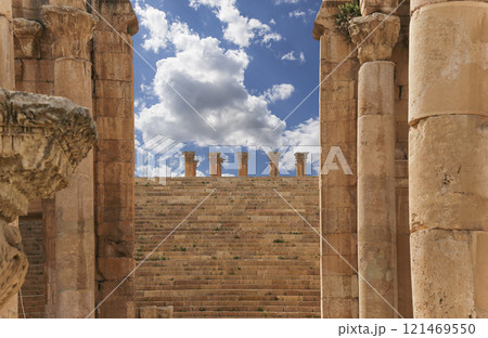 Roman ruins (against the background of a beautiful sky with clouds) in the Jordanian city of Jerash (Gerasa of Antiquity), capital and largest city of Jerash Governorate, Jordan Roman ruins (against the background of a beautiful sky with clouds) in the Jordanian city of Jerash (Gerasa of Antiquity), capital and largest city of Jerash Governorate, Jordan 121469550