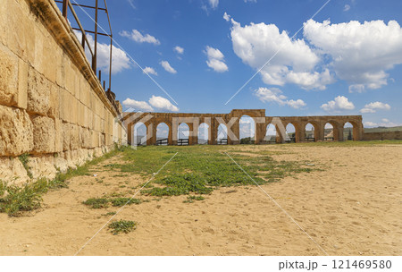 Roman ruins (against the background of a beautiful sky with clouds) in the Jordanian city of Jerash (Gerasa of Antiquity), capital and largest city of Jerash Governorate, Jordan Roman ruins (against the background of a beautiful sky with clouds) in the Jordanian city of Jerash (Gerasa of Antiquity), capital and largest city of Jerash Governorate, Jordan 121469580