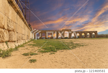 Roman ruins (against the background of a beautiful sky with clouds) in the Jordanian city of Jerash (Gerasa of Antiquity), capital and largest city of Jerash Governorate, Jordan 121469581