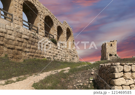 Roman ruins (against the background of a beautiful sky with clouds) in the Jordanian city of Jerash (Gerasa of Antiquity), capital and largest city of Jerash Governorate, Jordan Roman ruins (against the background of a beautiful sky with clouds) in the Jordanian city of Jerash (Gerasa of Antiquity), capital and largest city of Jerash Governorate, Jordan 121469585