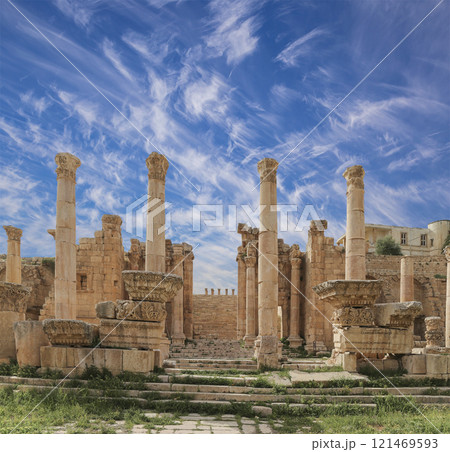 Roman ruins (against the background of a beautiful sky with clouds) in the Jordanian city of Jerash (Gerasa of Antiquity), capital and largest city of Jerash Governorate, Jordan Roman ruins (against the background of a beautiful sky with clouds) in the Jordanian city of Jerash (Gerasa of Antiquity), capital and largest city of Jerash Governorate, Jordan 121469593
