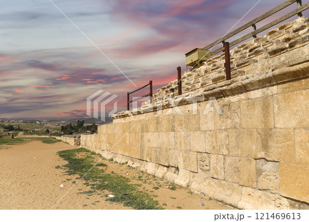 Roman ruins (against the background of a beautiful sky with clouds) in the Jordanian city of Jerash (Gerasa of Antiquity), capital and largest city of Jerash Governorate, Jordan 121469613
