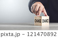 Man selects between the words 'CHANGE' and 'CHANCE' on wooden blocks, symbolizing the decision-making process and embracing opportunities for growth Man selects between the words 'CHANGE' and 'CHANCE' on wooden blocks, symbolizing the decision-making process and embracing opportunities for growth 121470892