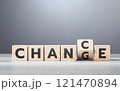 Man selects between the words 'CHANGE' and 'CHANCE' on wooden blocks, symbolizing the decision-making process and embracing opportunities for growth Man selects between the words 'CHANGE' and 'CHANCE' on wooden blocks, symbolizing the decision-making process and embracing opportunities for growth 121470894
