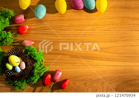 colorful easter eggs tulips old wooden board happy easter space for inscription colorful easter eggs tulips old wooden board happy easter space for inscription 121470934