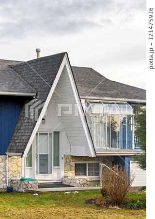 Entrance of original residential house with lighthouse over patio 121475916