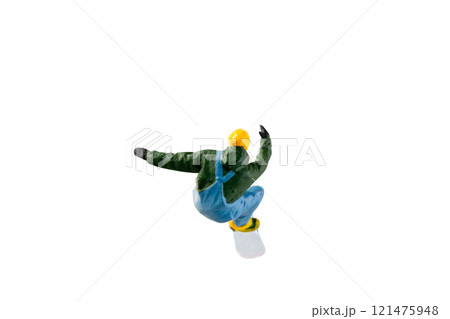 Miniature figurine depicting a snowboarder in mid-motion isolate on white background with clipping path 121475948