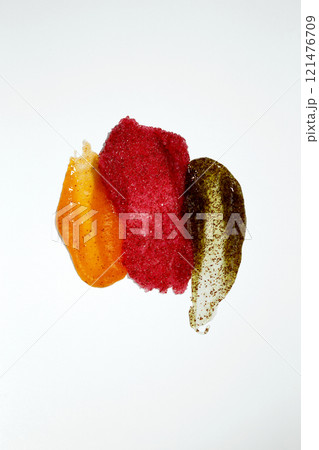 Fruit and berry body scrub texture of the swatch. Set smears of body scrub. Cosmetic smear Fruit and berry body scrub texture of the swatch. Set smears of body scrub. Cosmetic smear 121476709