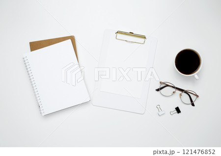 Flat lay composition with copy space. Office workspace and productivity concept. Mock up notebook Flat lay composition with copy space. Office workspace and productivity concept. Mock up notebook 121476852