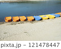 Colorful boats on the shore of the lake, closeup of photo 121478447