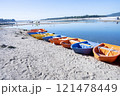 Colorful row boats on the beach of a small island in the Baltic Sea 121478449