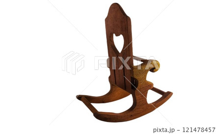 Miniature rocking chair toy on white background 121478457