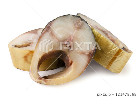 Pieces of smoked mackerel on a white background. Isolated Pieces of smoked mackerel on a white background. Isolated 121478569