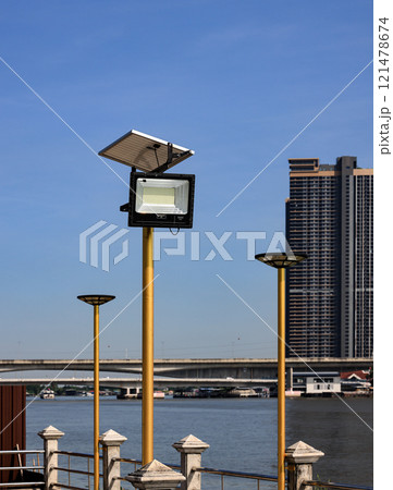 Solar cell lamp, Roadside electric pole with a solar panel to generate renewable photovoltaic electricity. Solar cell lamp, Roadside electric pole with a solar panel to generate renewable photovoltaic electricity. 121478674