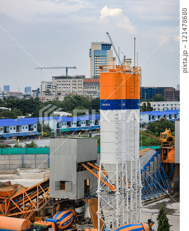Cement silos of Cement batching plant factory or Concrete mixing tower. Concept of on-site construction facility. 121478680