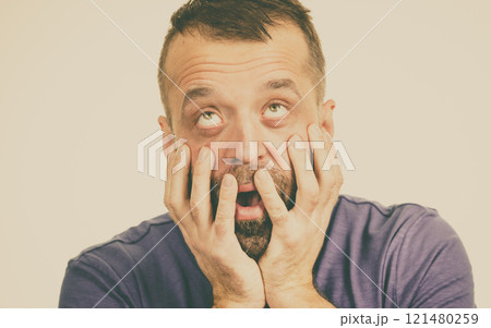 Scared adult man 121480259