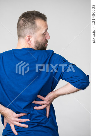 Man having back loins pain ache 121480338