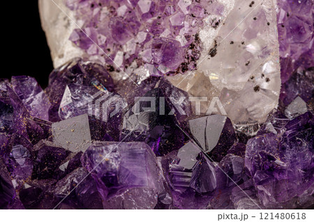 macro mineral amethyst stone with calcite black background 121480618