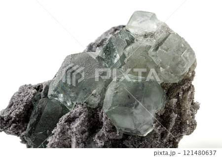 Macro stone Fluorite mineral on white background 121480637