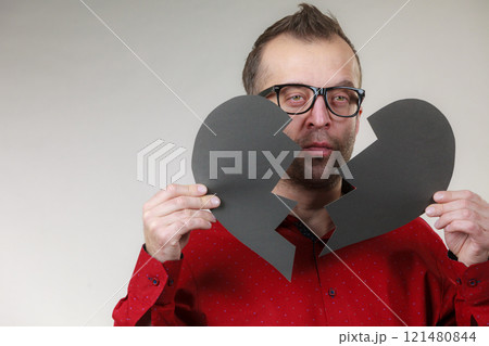 Sad man with broken heart. Sad man with broken heart. 121480844