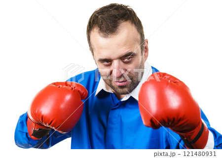 Adult man wearing boxing gloves Adult man wearing boxing gloves 121480931