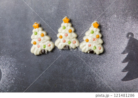 Christmas chocolates. Chocolate Christmas trees. 121481286