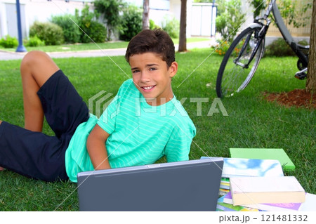 boy teenager homework studying sitting garden boy teenager homework studying sitting garden 121481332