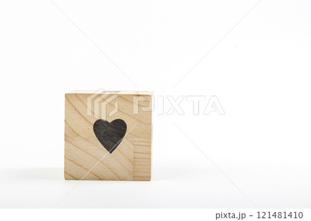 Wooden cubes with the inscription heart on a white background Wooden cubes with the inscription heart on a white background 121481410