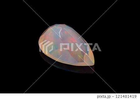 macro mineral stone faceted opal on a black background 121481419